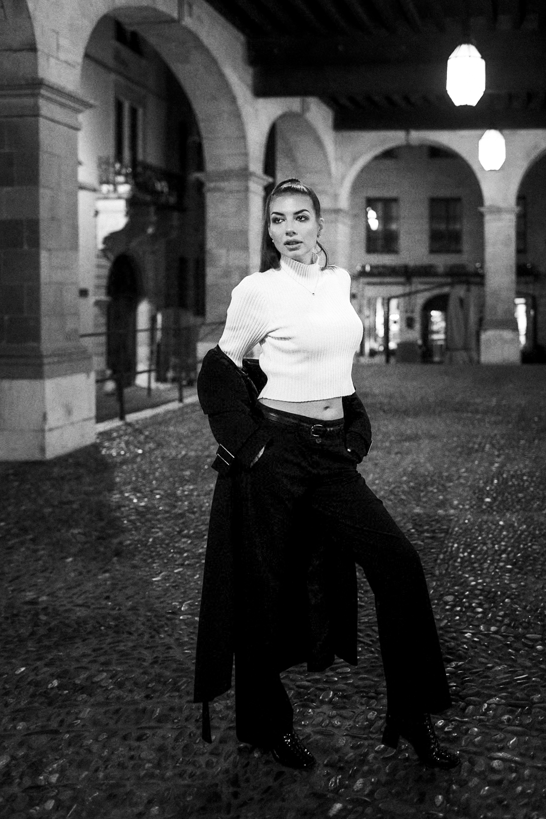 Evgeniya under an arch in Geneva’s Old Town
